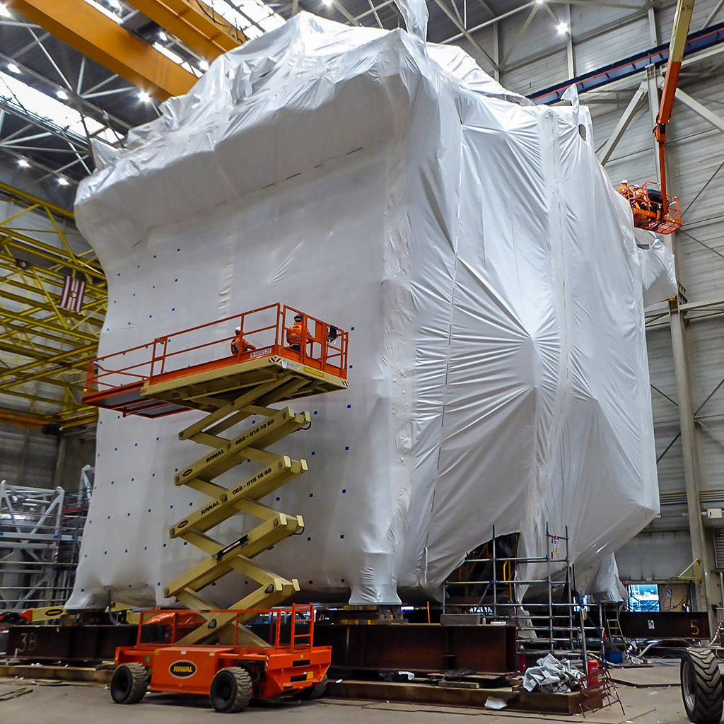 Heavy industrial machinery shrink wrapped with Rhino Shrink Wrap 14m 250 micron film