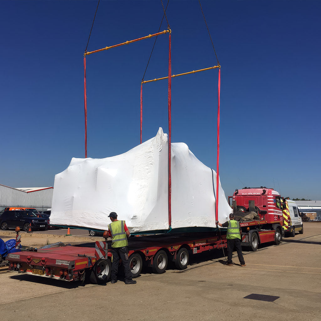 Large industrial asset wrapped with Rhino Shrink Wrap for storage and transport