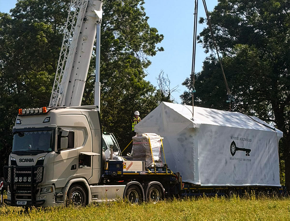 Modular building enclosed with Rhino Shrink Wrap for weather protection during transport