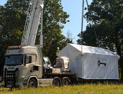 Modular building enclosed with Rhino Shrink Wrap for weather protection during transport