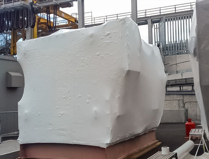 Industrial equipment shrink wrapped for weather protection using Rhino 8m film
