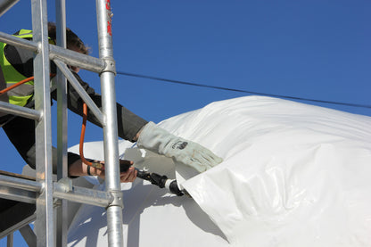 Shrink Wrapping Gloves being used